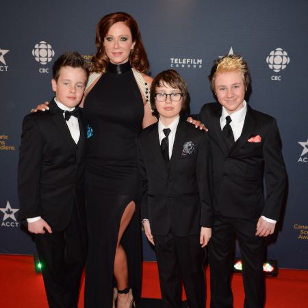 Lauren Holly and her three adopted children